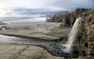 Beautiful waterfall at Stengel Beach by Allen Vinson