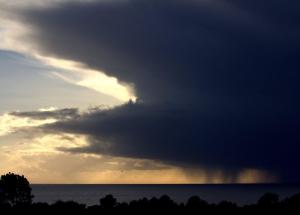 Hail Storm Coming by Robert Scarola