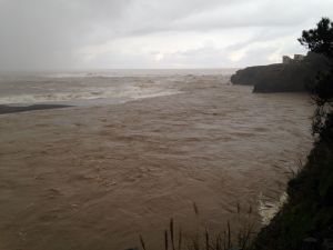 The raging Gualala River by Chris Howard