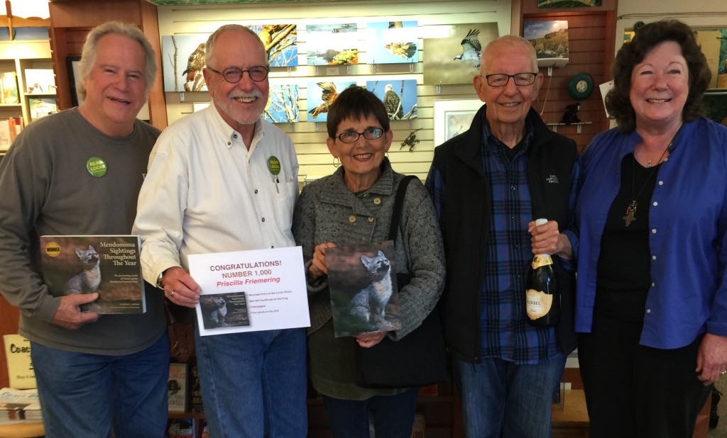 Author Jeanne Jackson, far right, joins the owners of Four-Eyed Frog Books in Gualala in celebrating the purchase of the 1,000 copy of Mendonoma Sightings by Priscilla Fiemering, center. Photo by Jeri Taylor.