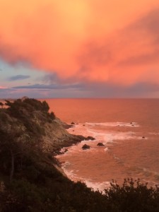 Thundercloud reflected in the Pacific Ocean by Colleen Cross