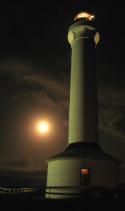 Sturgeon Moon tries to outshine the Point Arena Lighthouse by Glenn Funk