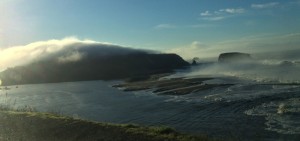 The mouth of the Russian River with storm-driven waves by Michael Alexander