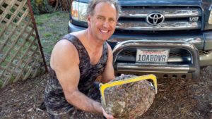 Roger Rude with a huge Abalone by Jack Likins