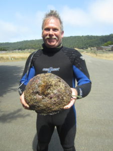 Mel Huse with a trophy Abalone by Jack Likins